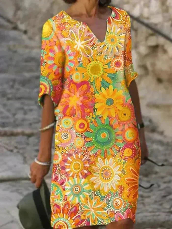 Angelique | Strahlendes Blumen-Midi-Kleid.