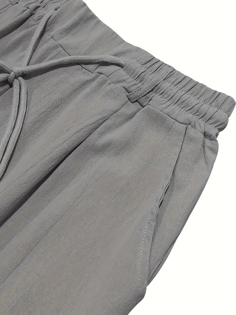 NICHOLS | Weite Leinenhose mit Kordelzug