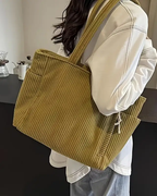 Tilda – Rippstrick Tragetasche mit Kordel-Design