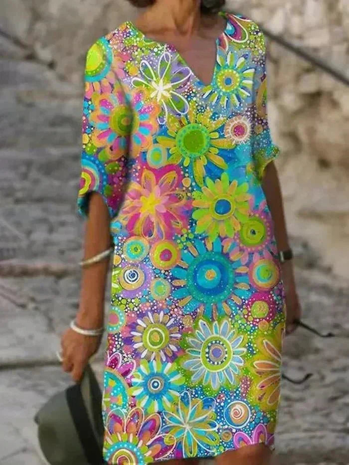 Angelique | Strahlendes Blumen-Midi-Kleid.