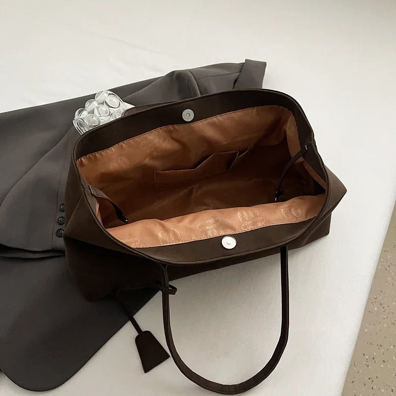 Kyadeeih | Elegante Tragetasche